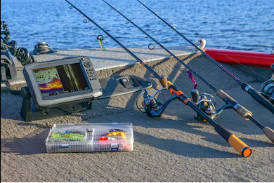 Three fishing rods with fish finder