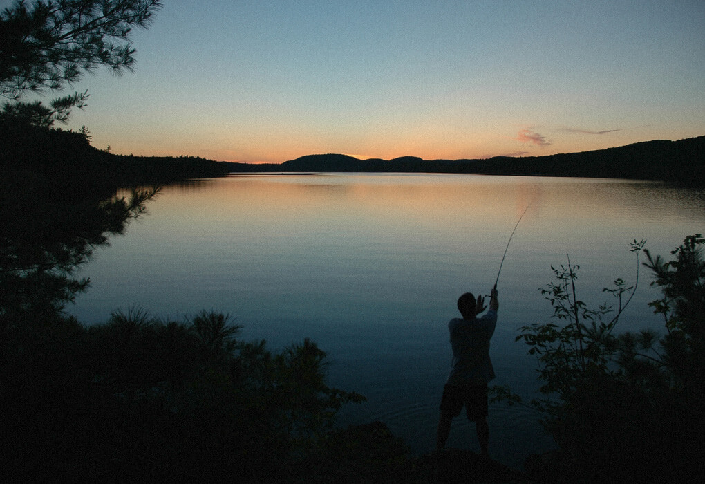 fishing for bass with tube baits, in the evening