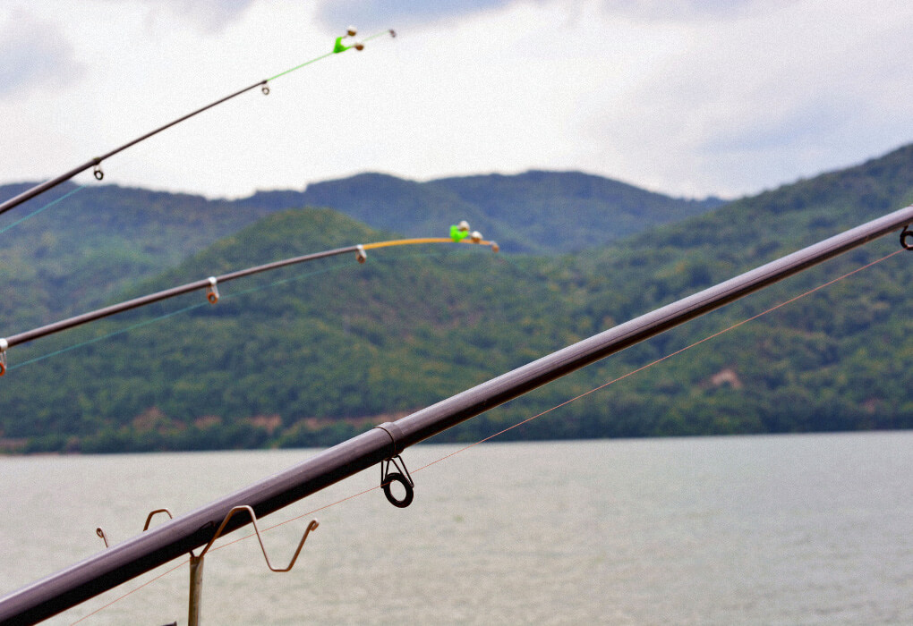 fishing rods mounted for bass fishing on a lake