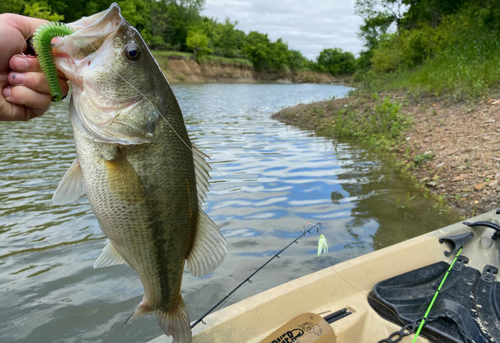 Wesley Littlefield fishing for bass in his kayak