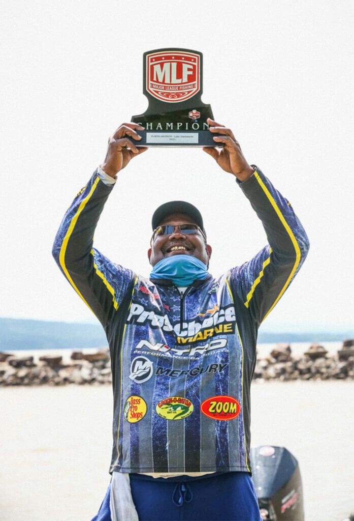 Michael Carter celebrated after winning the co-angler championship in a Major League Fishing Toyota Series tournament at Dardanelle Lake (photo by Matt Brown/Major League Fishing).