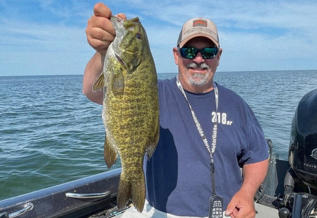 Dan McGannon showed off a big smallmouth caught at Mille Lacs Lake. (Photo by Brent Frazee)